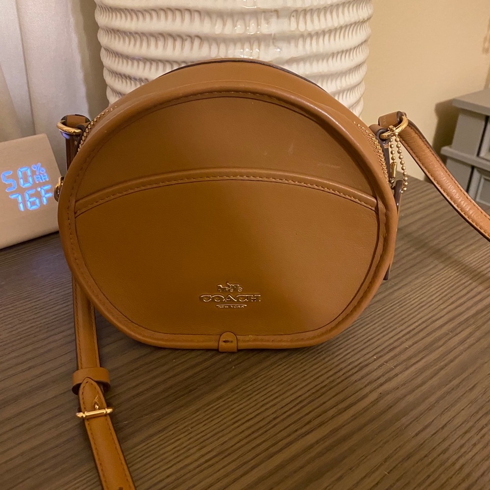 Coach round sling bag small.